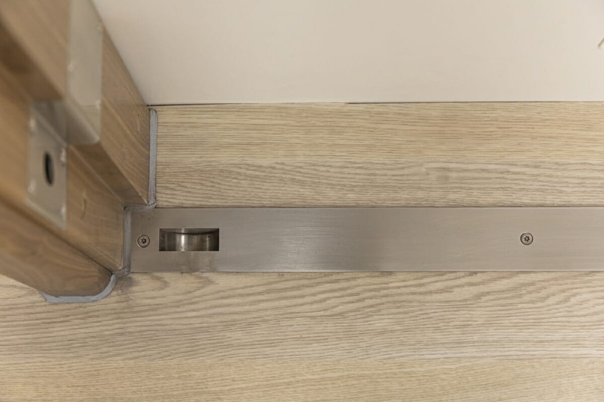 The unique threshold strip provides a secure locking point for the SECLUSION Door System.