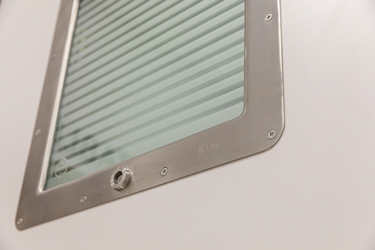 The ligature resistant SECLUSION Door System featuring a Duralux High Secure Vision Panel for safe observation of patients.