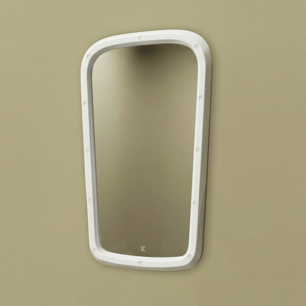 An anti-ligature mirror, co-produced as part of Kingsway's Kalm washroom range for mental health environments.