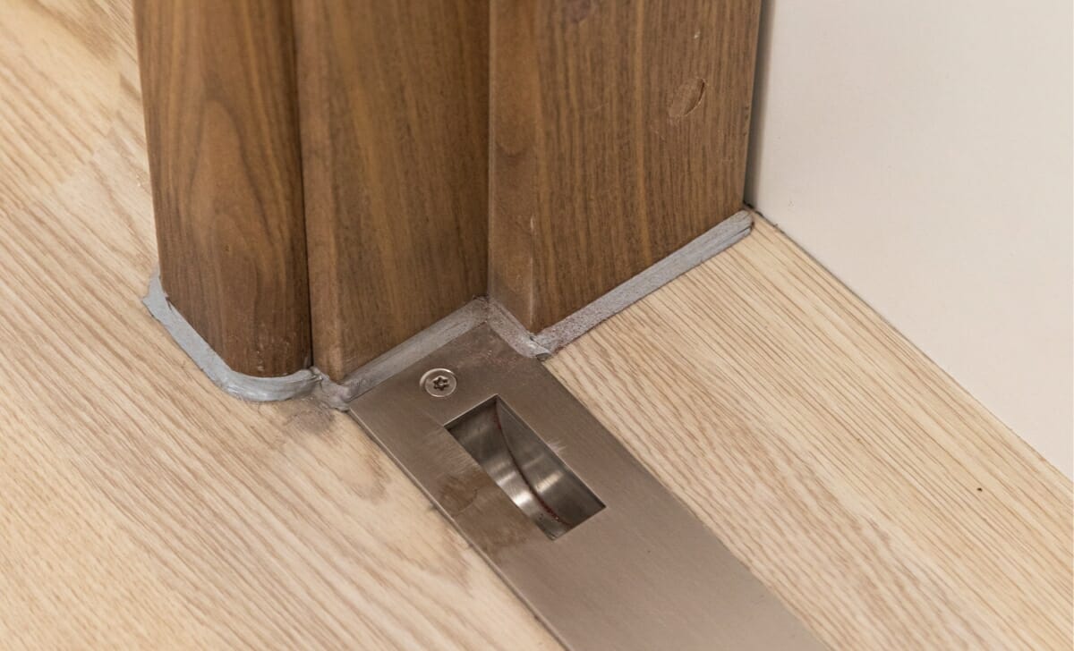 The unique threshold strip provides a secure locking point for the SECLUSION Door System.