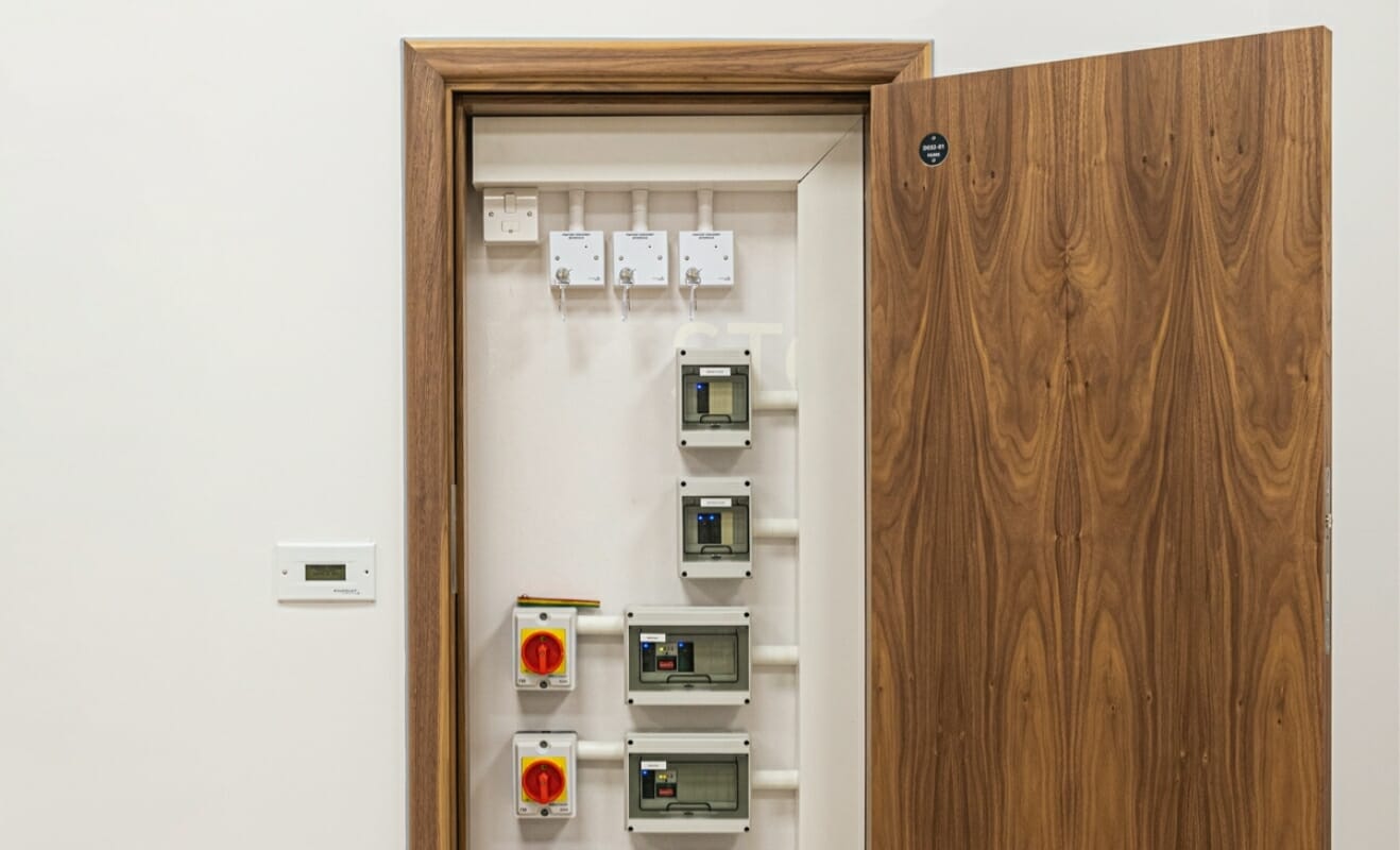 The SERVICE anti-ligature riser cupboard door providing secure access to mechanical and electrical controls.