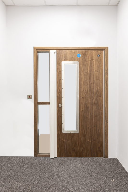 SOLO Complete Door System with high-strength mag lock, side panels, and Oblong Pyrolux Vision Panel.