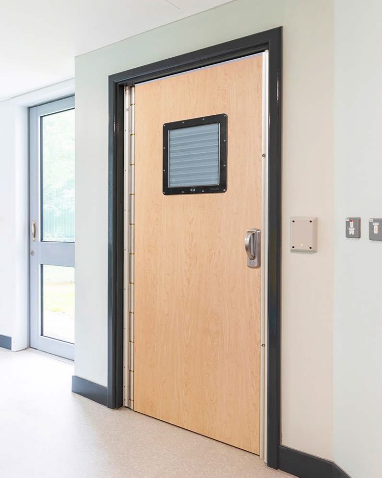 Behavioural Health Anti Barricade Door: SWING by Kingsway Group.